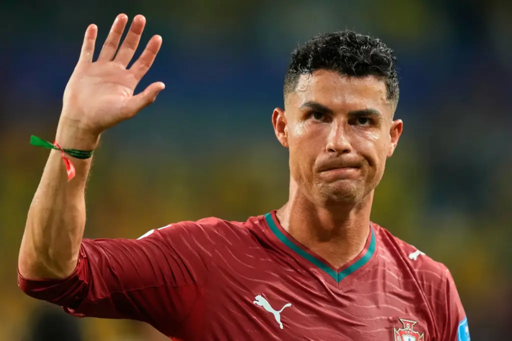 Portugal’s Cristiano Ronaldo (7) waves following the World Cup Group...