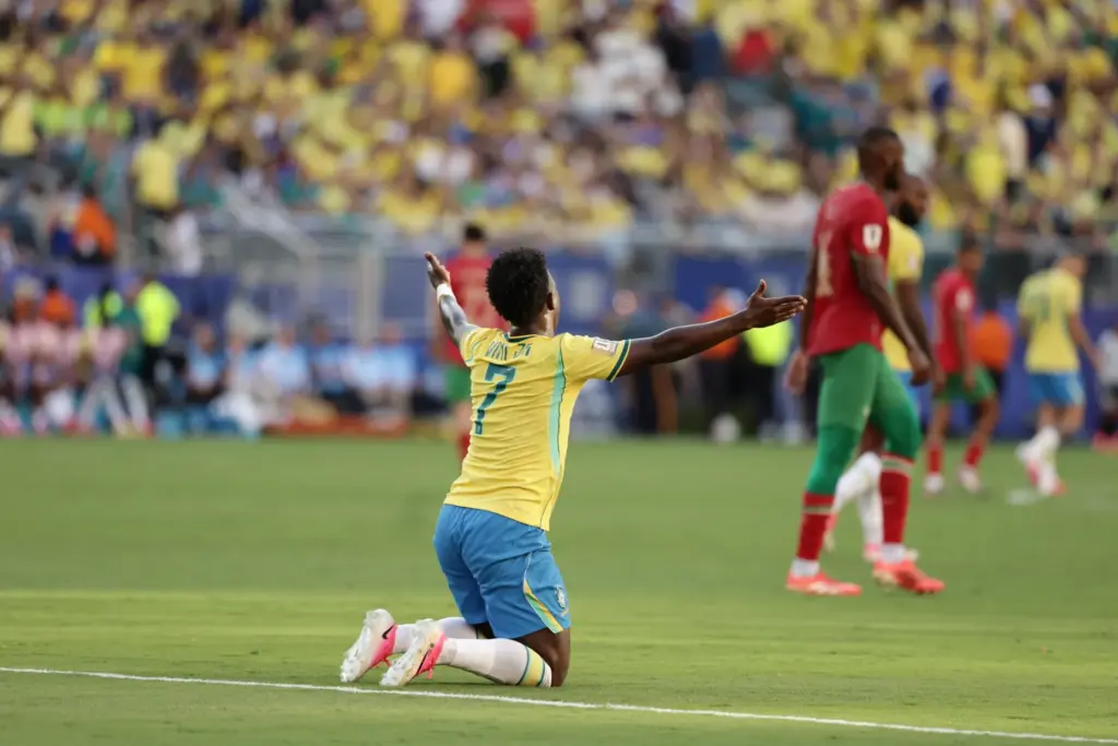 Brazil’s Vinicius Junior (7) reacts after being tripped in the...