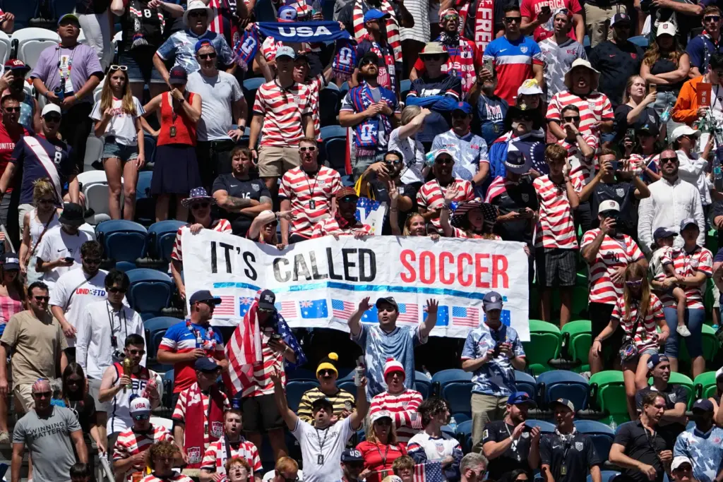 United States fans hold a sign on the stands at...