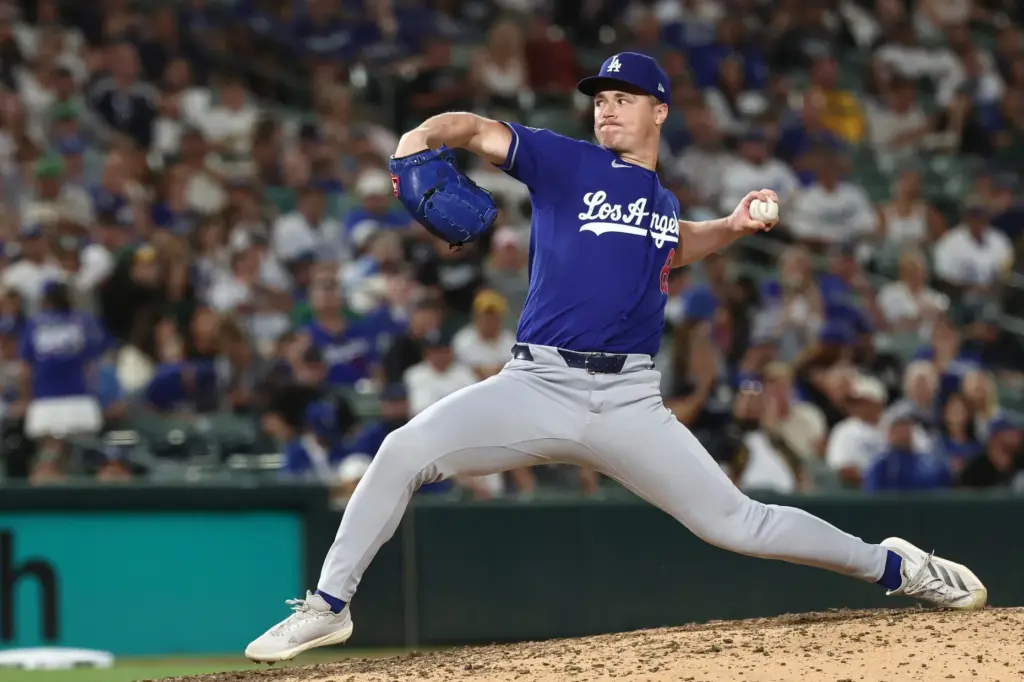 Dodgers relief pitcher Jack Dreyer throws to plate during the...