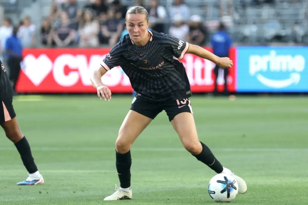 Angel City FC midfielder Evelyn Shores controls the bal; against...