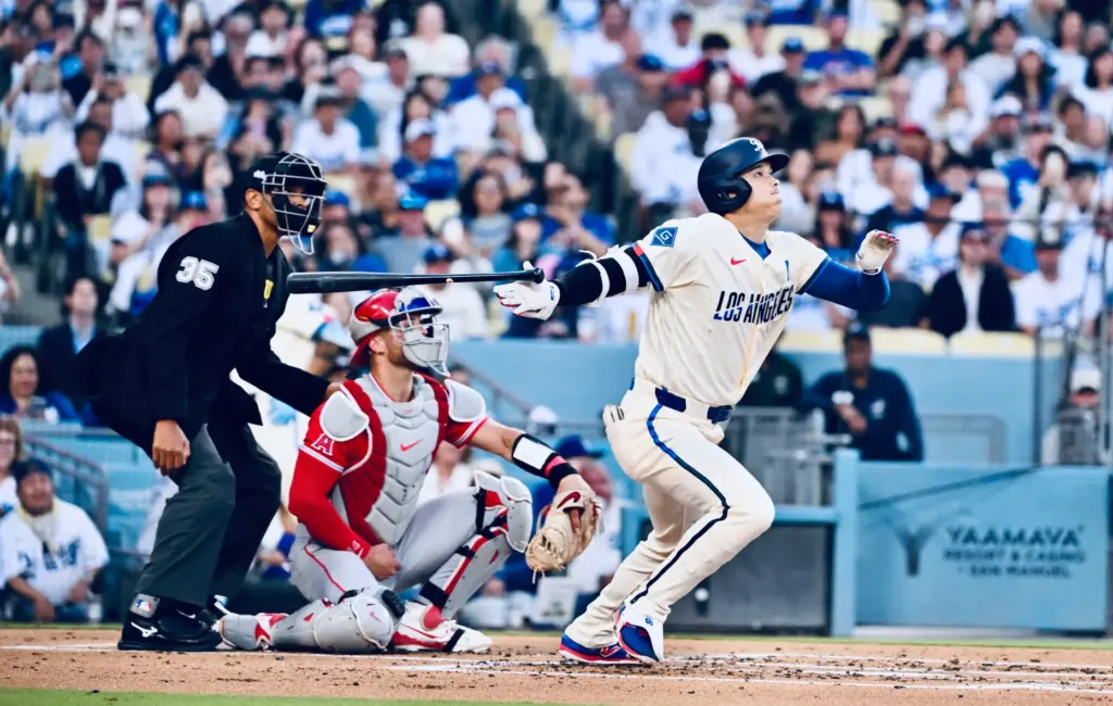 Shohei Ohtani #17 of the Dodgers singles against the Angels...