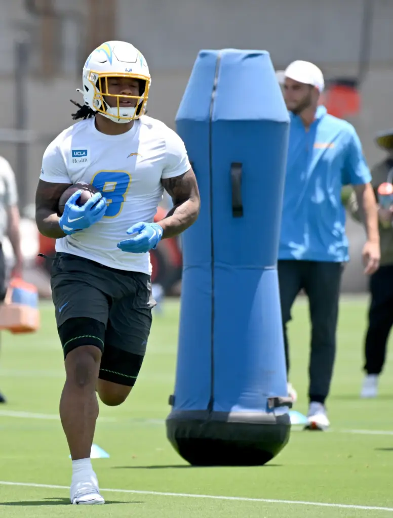 Chargers running back Omarian Hampton (8) participates in a team...