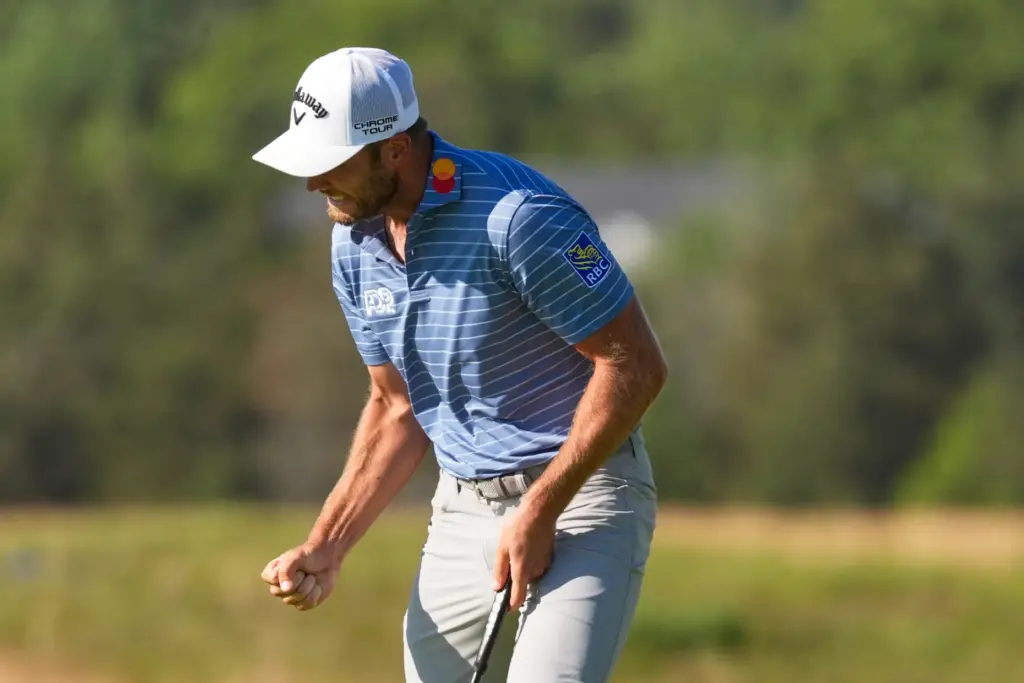 Sam Burns celebrates after a birdie on the 16th hole...