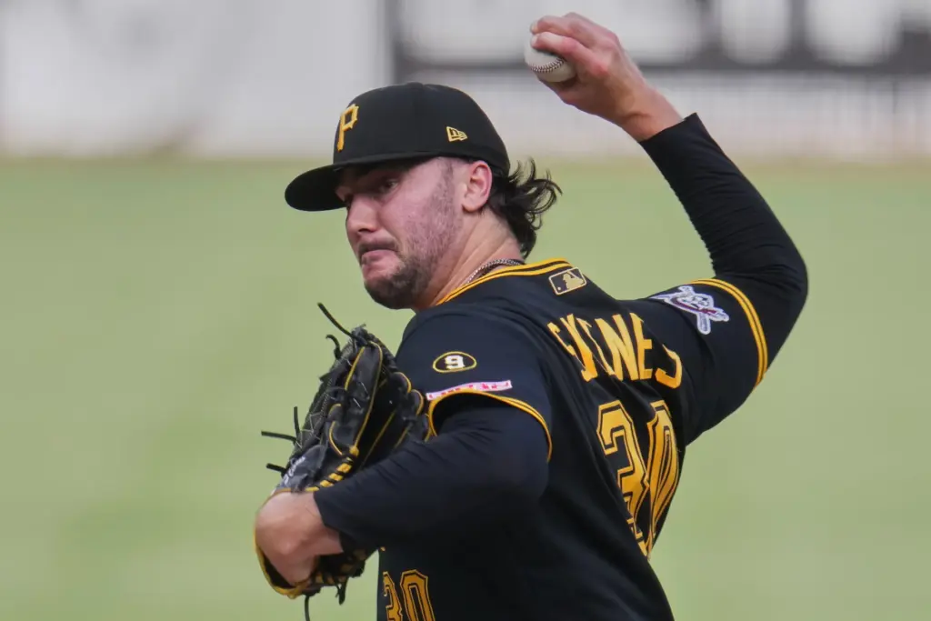 Pittsburgh Pirates starting pitcher Paul Skenes throws to the plate...