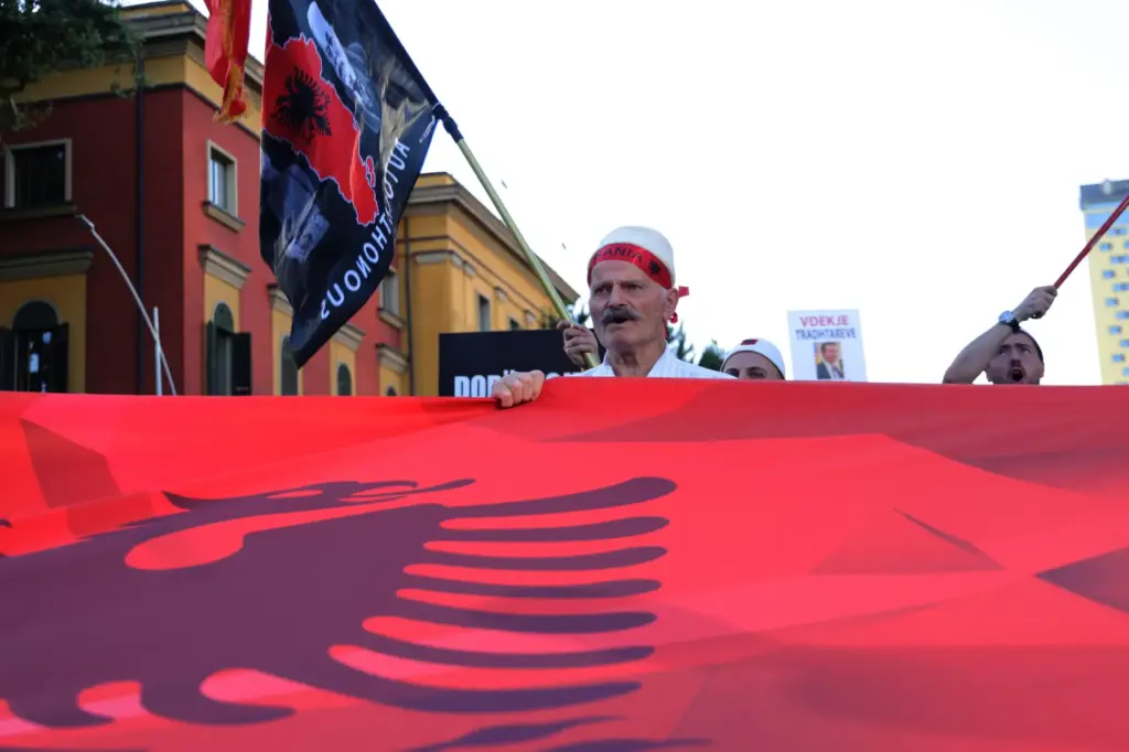Protesters take part in a rally in Tirana, Albania, Tuesday,...