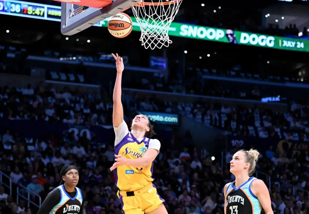 Los Angeles Sparks forward Dearica Hamby (5) drives to the...