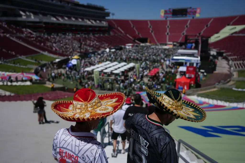 Fans arrive at a fan festival at the Los Angeles...