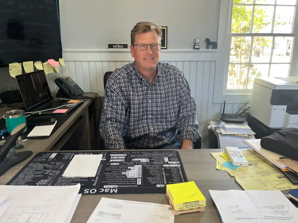 John Miller sits in his office at JK Design in Social Circle, Georgia.
