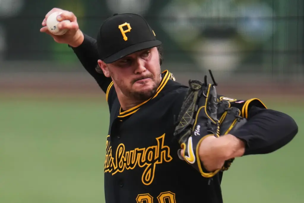Pittsburgh Pirates starting pitcher Paul Skenes throws to the plate...