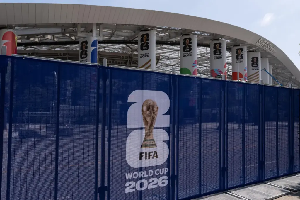 Temporary fencing with FIFA World Cup 2026 signage is set...