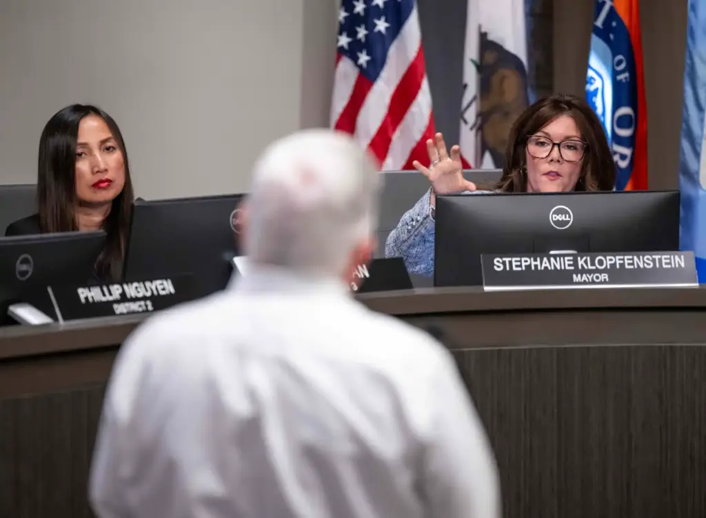 Garden Grove Mayor Stephanie Klopfenstein, right, addresses GKN Aerospace Senior...