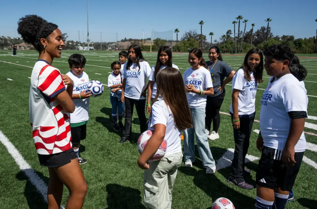 U.S. Womenâs National Team player Lily Yohannes talks to participants...
