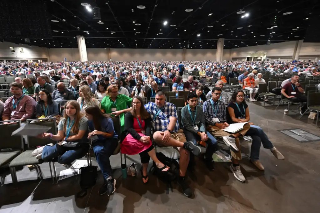 Attendees listen as presentations are discussed during the annual meeting...