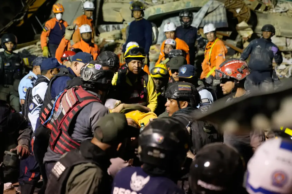 Rescue workers search through the rubble of a collapsed building...