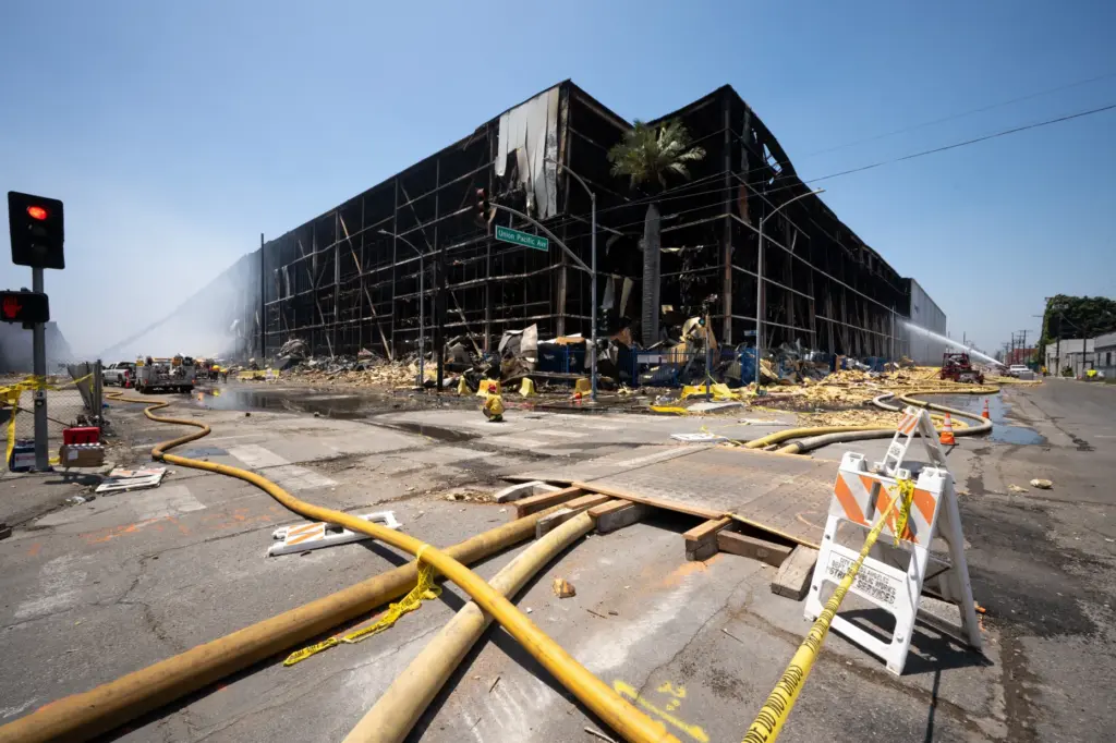 Firefighters use a high-powered water canons from Texes, used for...