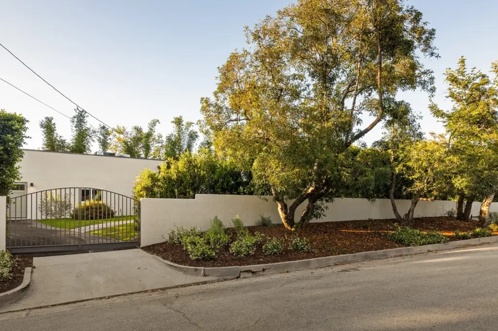 The walled and gated residence. (Photo by Cameron Carothers)