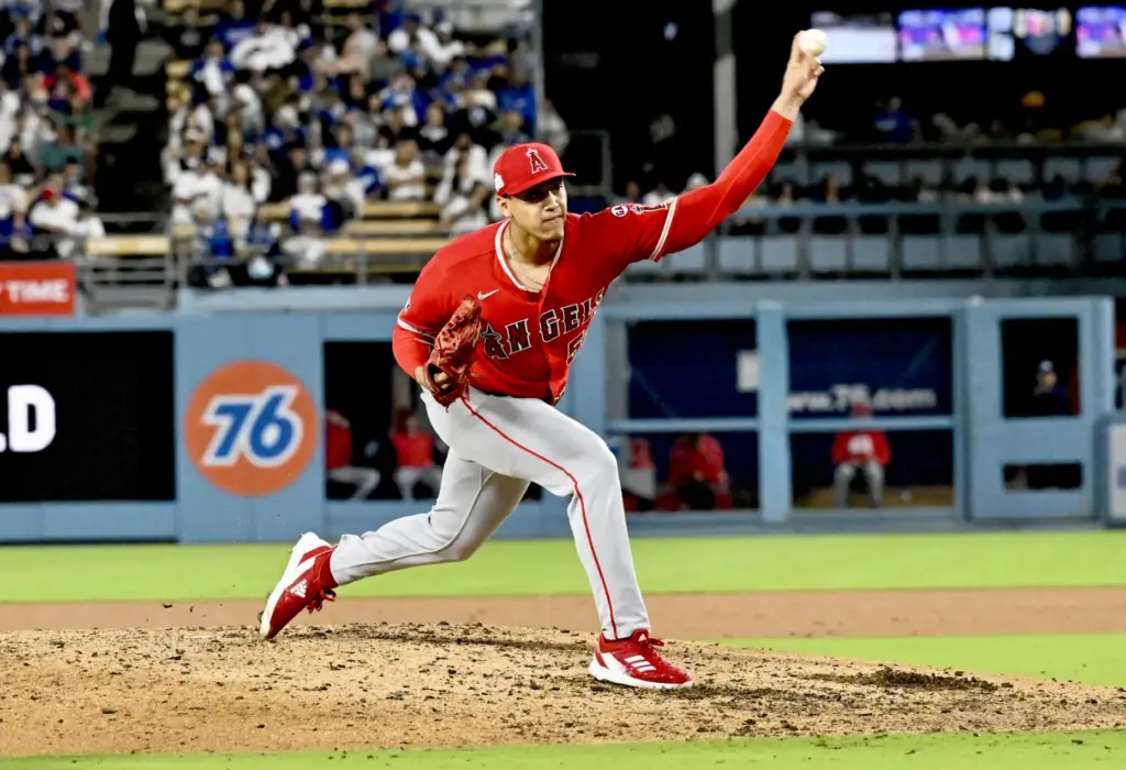 Relief pitcher Samuel Natera Jr. #52 of the Angels makes...