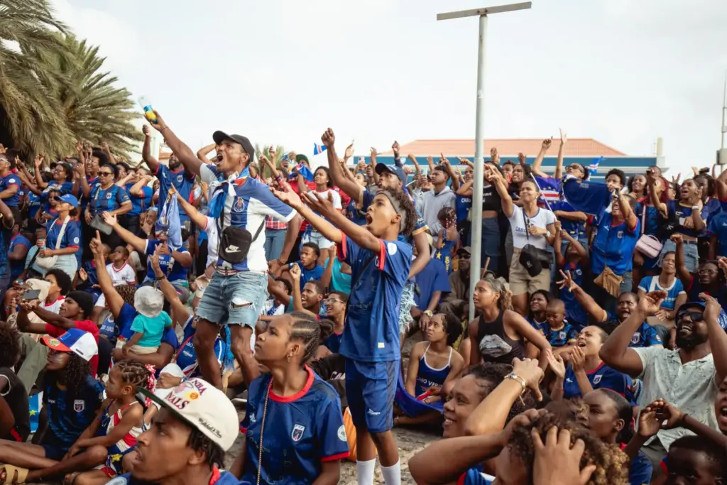 Fans react as they watch a broadcast of the Spain-Cape Verde World Cup match.
