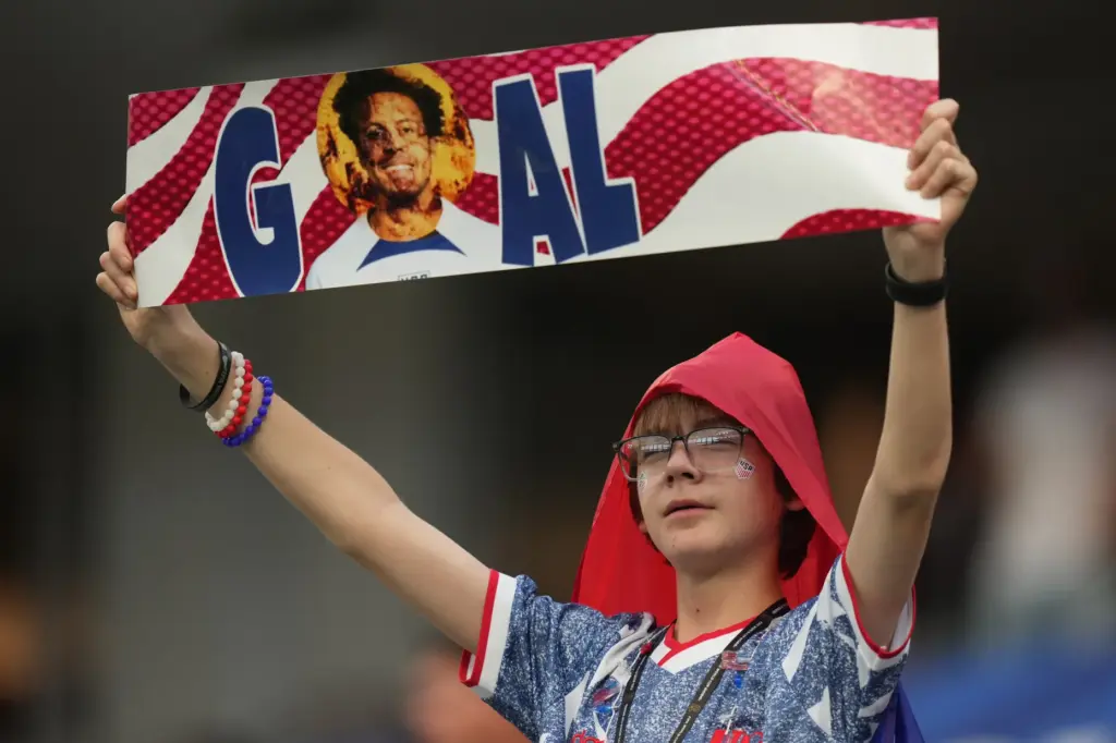 A fan of United States cheers prior to the World...