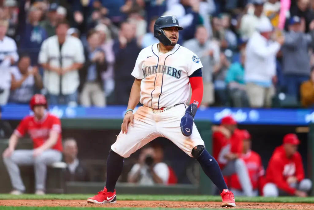 The Seattle Mariners’ Josh Naylor looks on after scoring on...