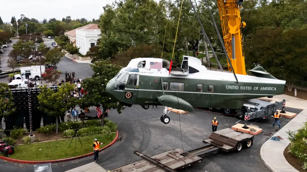 Workers at the Nixon Library in Yorba Linda load the...