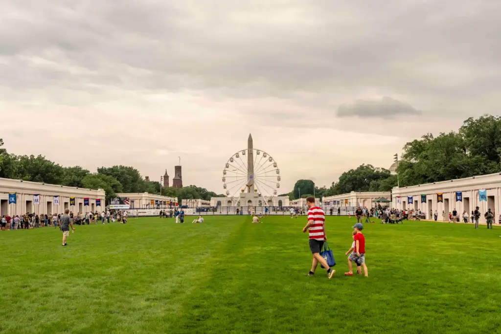 People attend the Great American State Fair on the National...