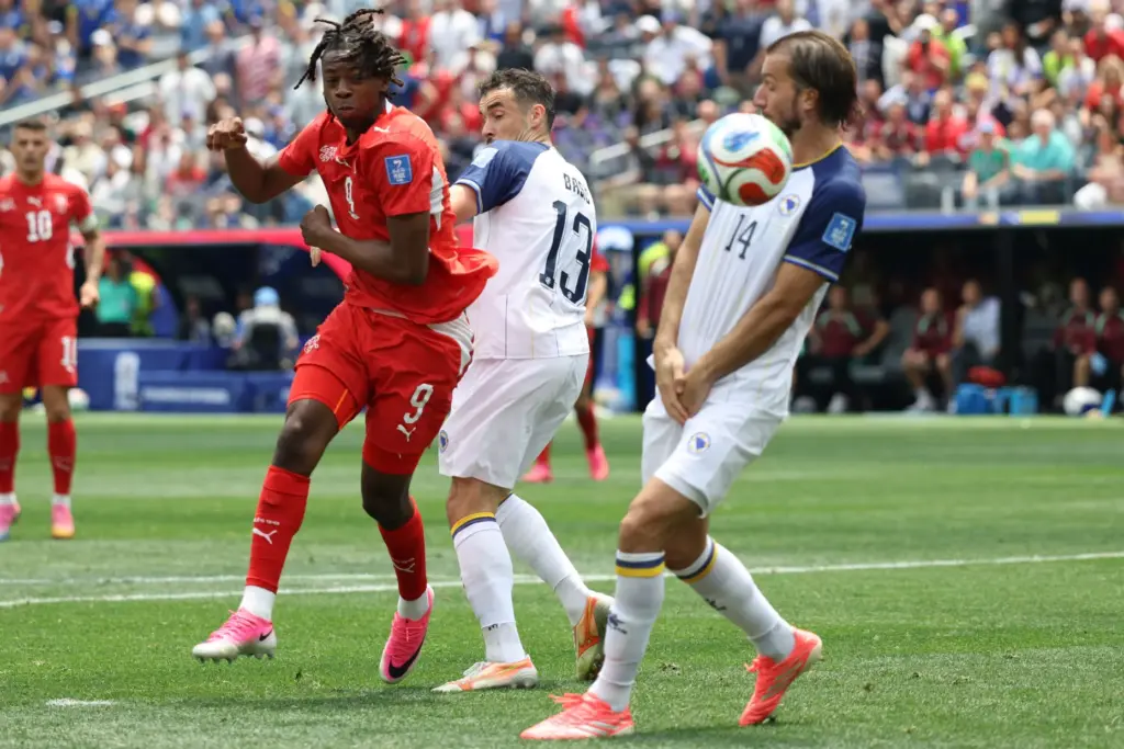 Switzerland midfielder Johan Manzambi (9) scores a goal against Bosnia...
