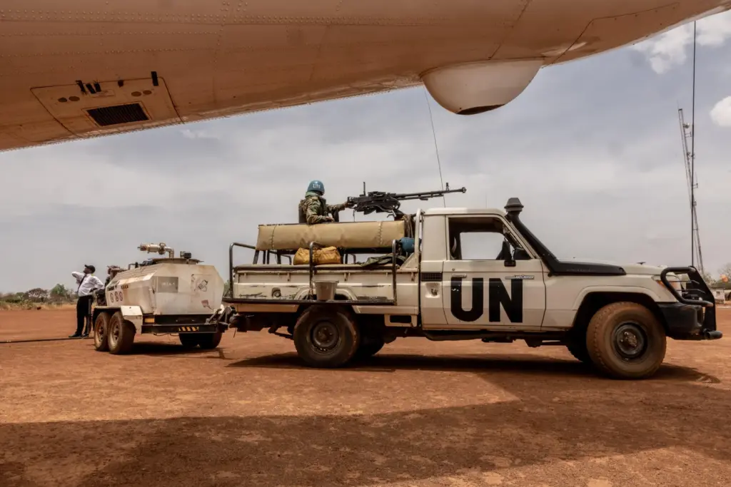 UN peacekeepers stand guard of a UN flight refuelling on...