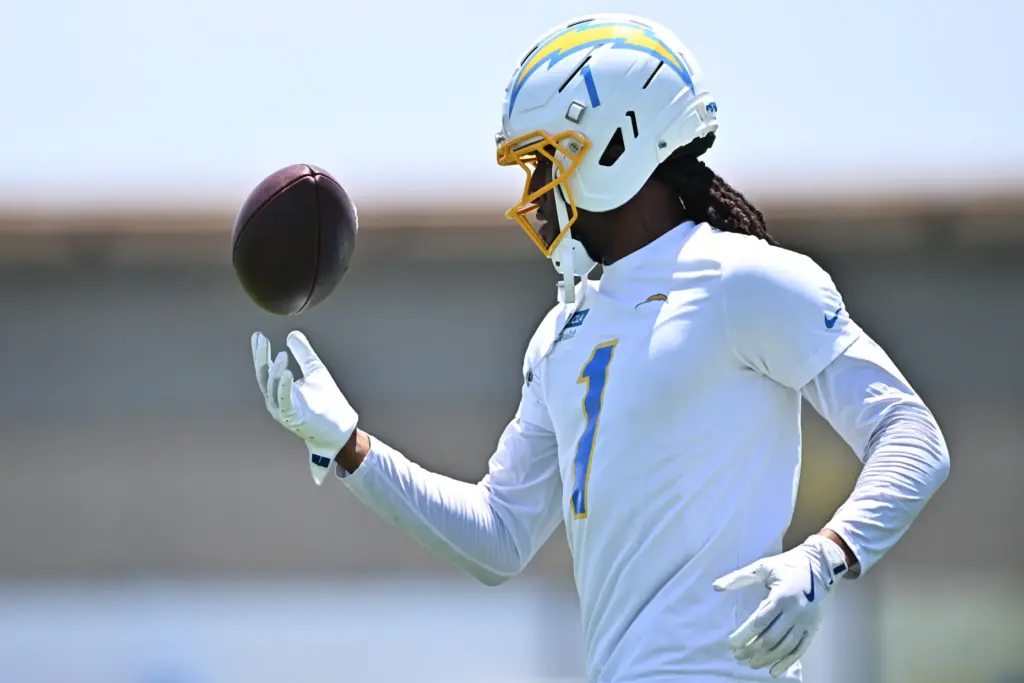 Chargers wide receiver Quentin Johnston runs a drill during the...