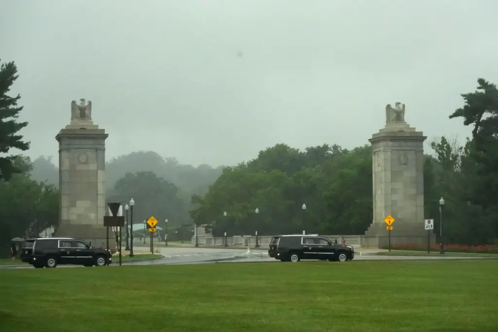 President Donald Trump’s motorcade travels in a loop around Memorial...