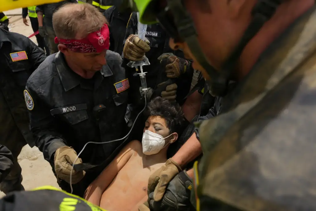 U.S. firefighters from the Fairfax County search and rescue team...