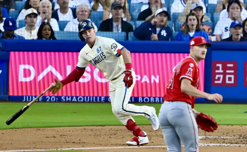 Dodgers’ Ryan Ward blasts a double against in a baseball...