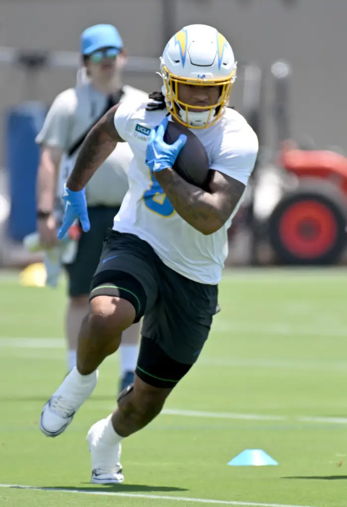 Chargers running back Omarian Hampton (8) participates in a team...