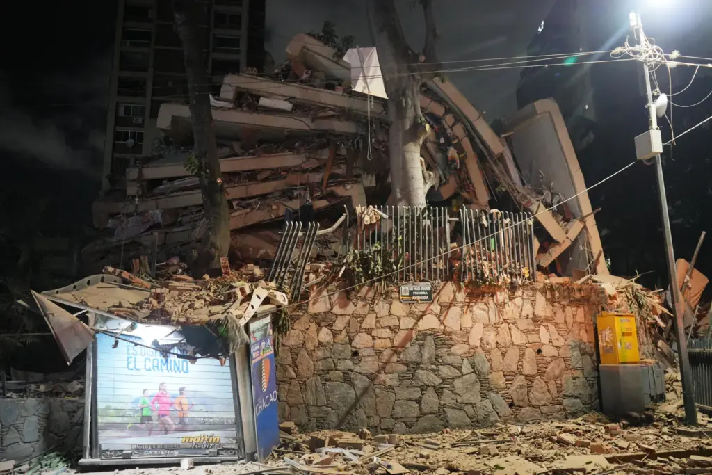 A collapsed building after an earthquake in Caracas, Venezuela, Wednesday,...