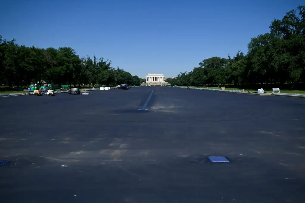 Work continues on the Lincoln Memorial Reflecting Pool, which is...