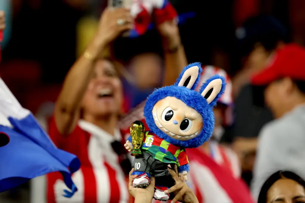 A “Bubu” wearing the traditional red-and-white striped Paraguay national team...