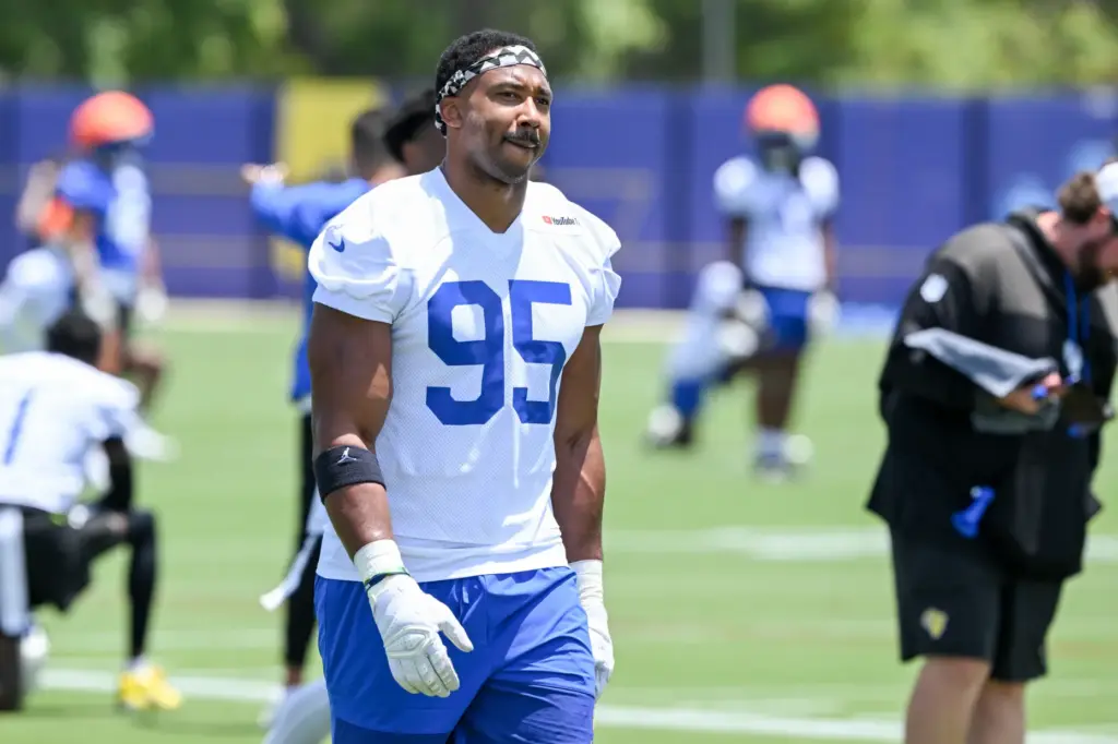 Newly acquired Rams defensive lineman Myles Garrett walks on the...