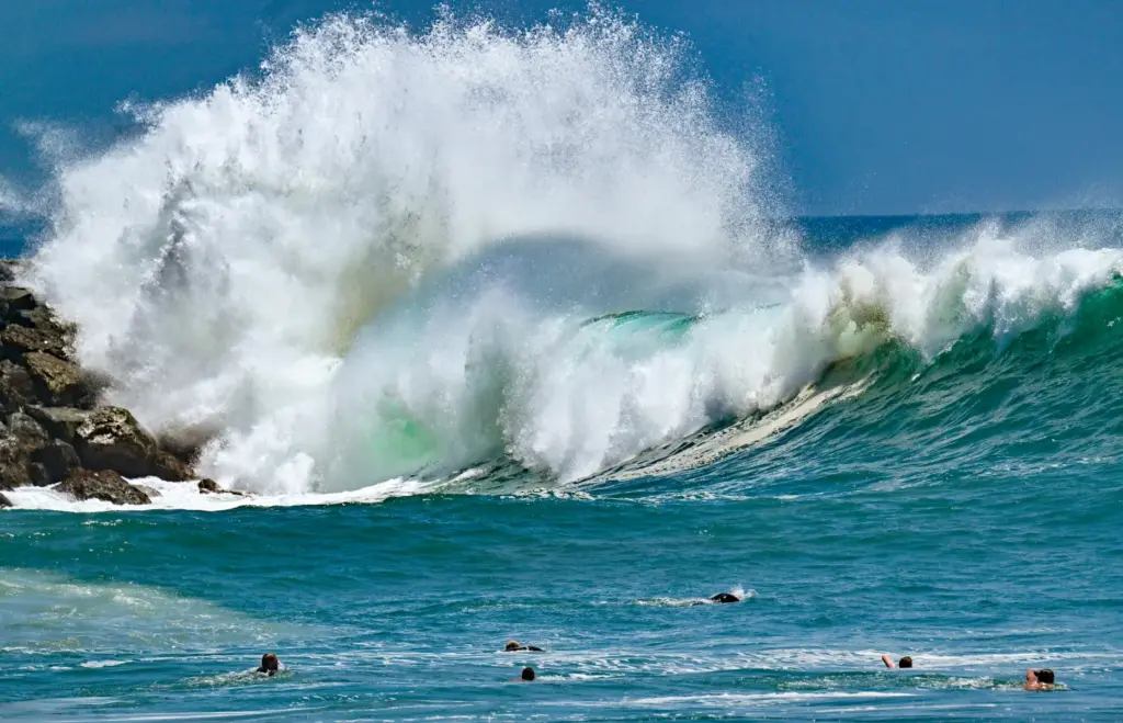 Bodyboarders take on big waves at The Wedge in Newport...