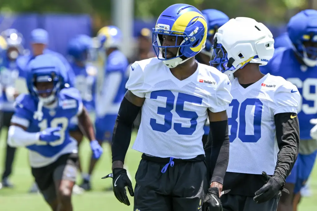 Rams cornerback Jaylen Watson walks on the field during an...
