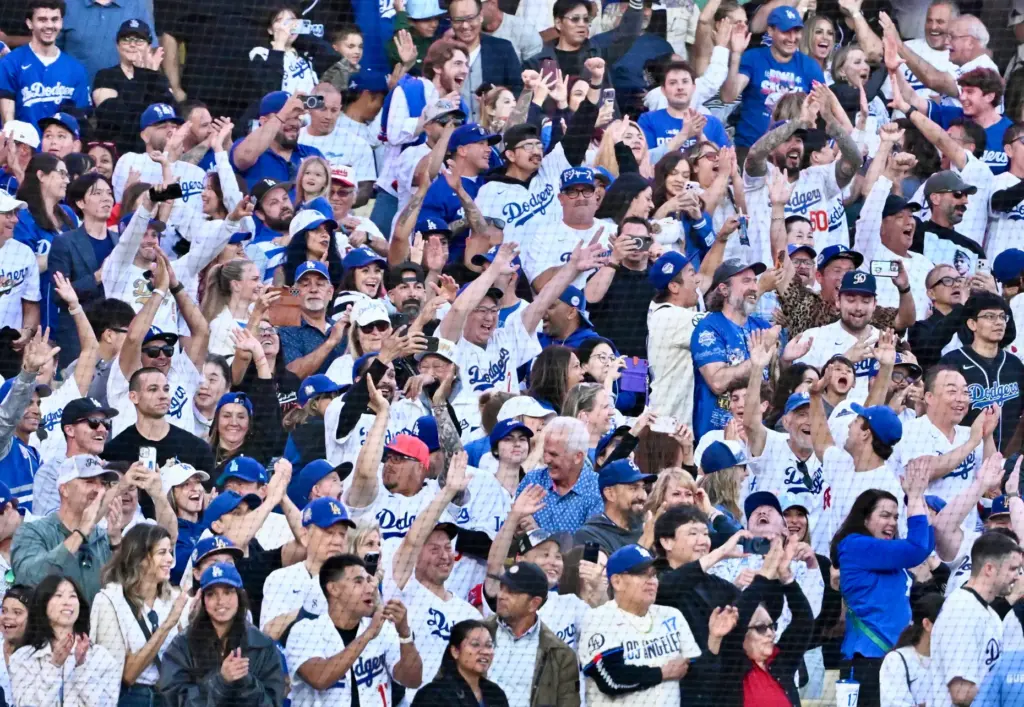 Dodgers fans cheer after Shohei Ohtani (not pictured) of the...