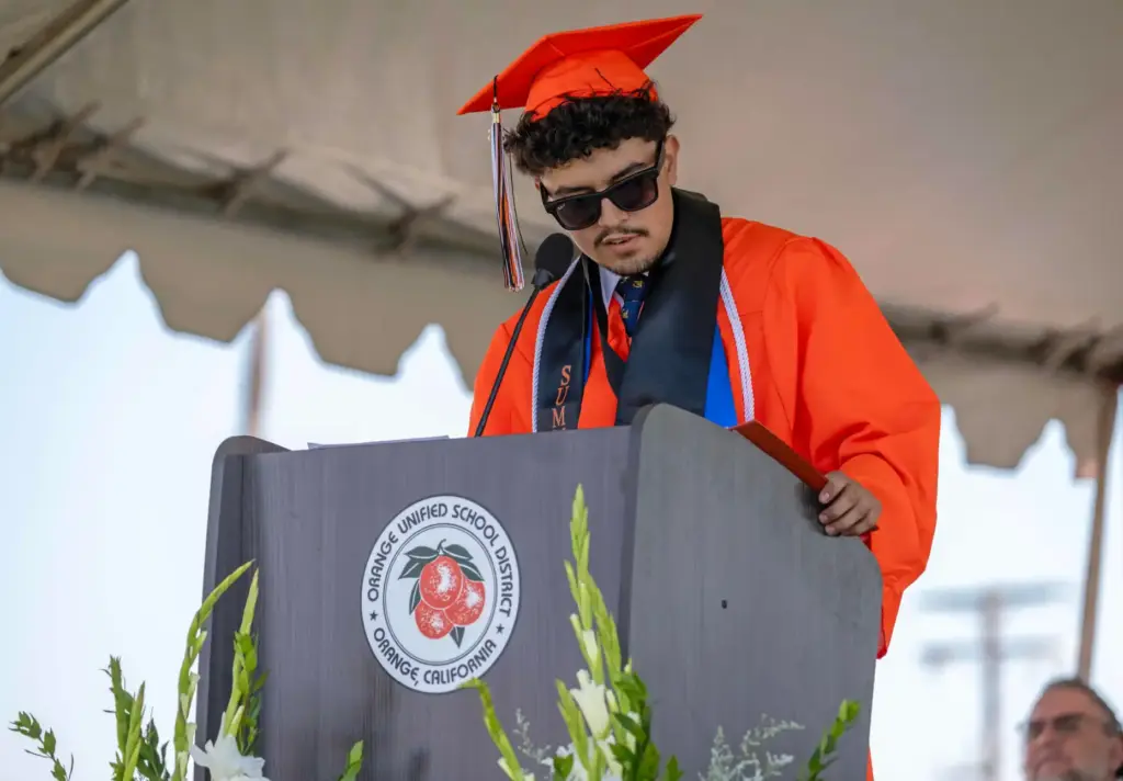 Kevin Salazar delivers the Valedictoriansâ Address during the Orange High...