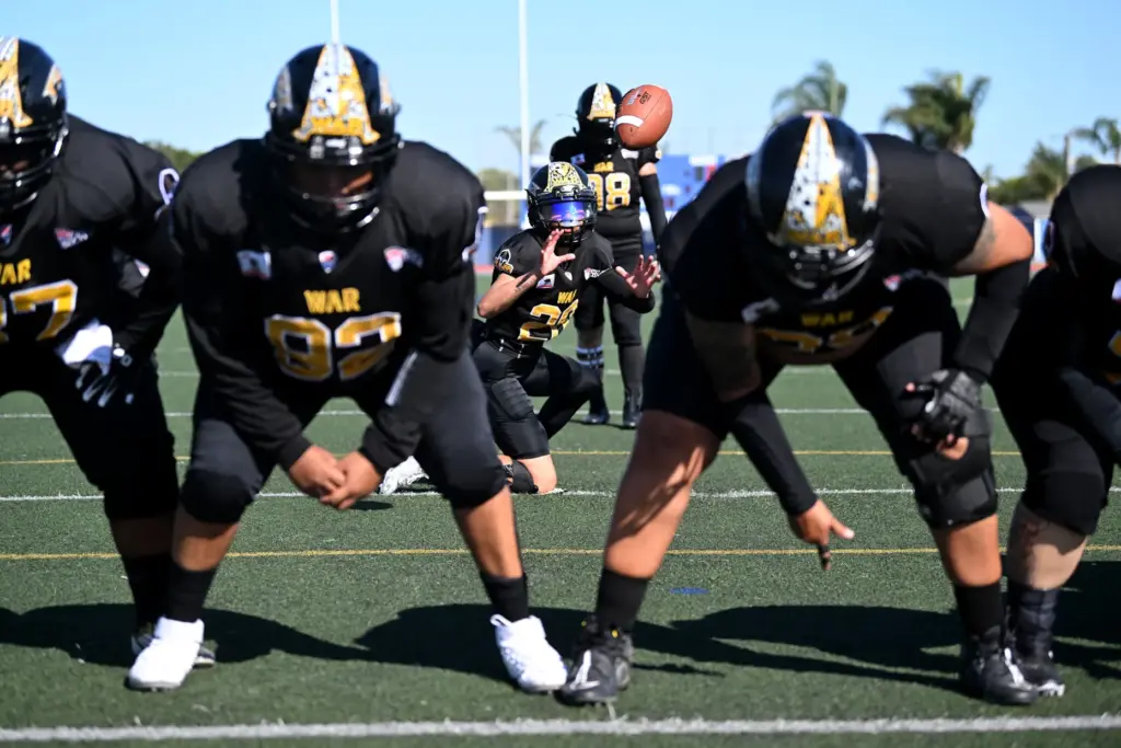 The Cali War kicking team lines up during practice before...