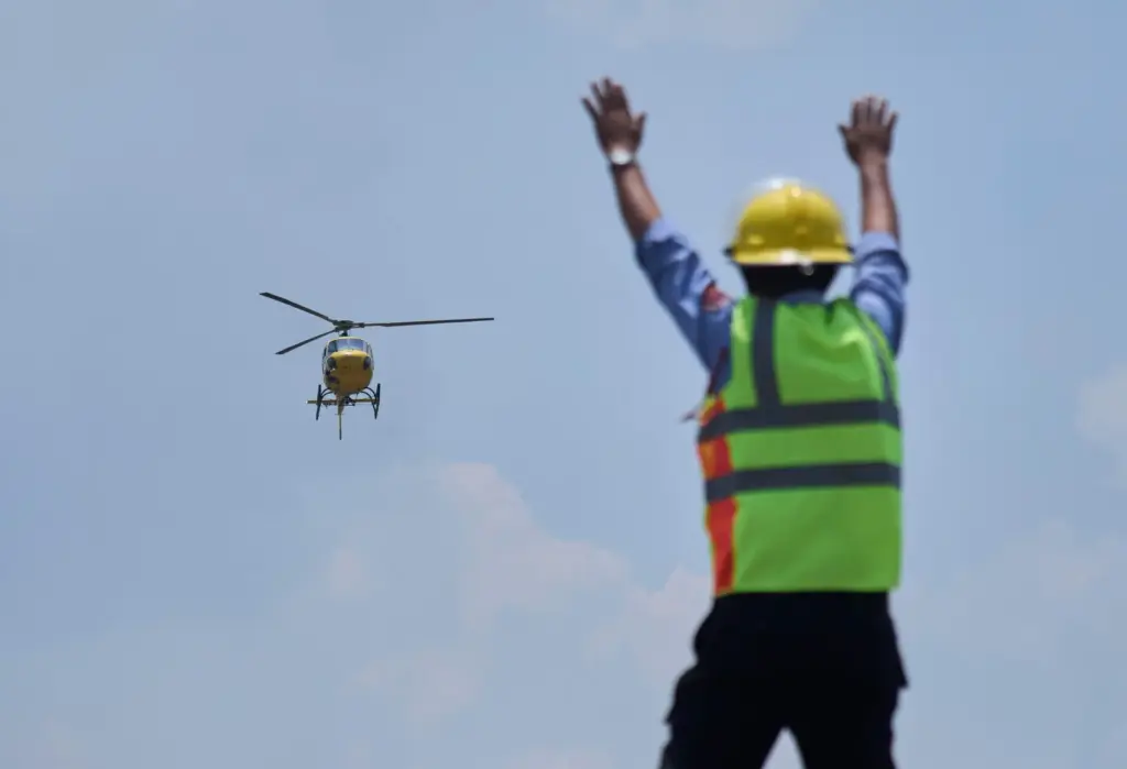 A helicopter carrying Dawa Sherpa, a mountain guide who had...