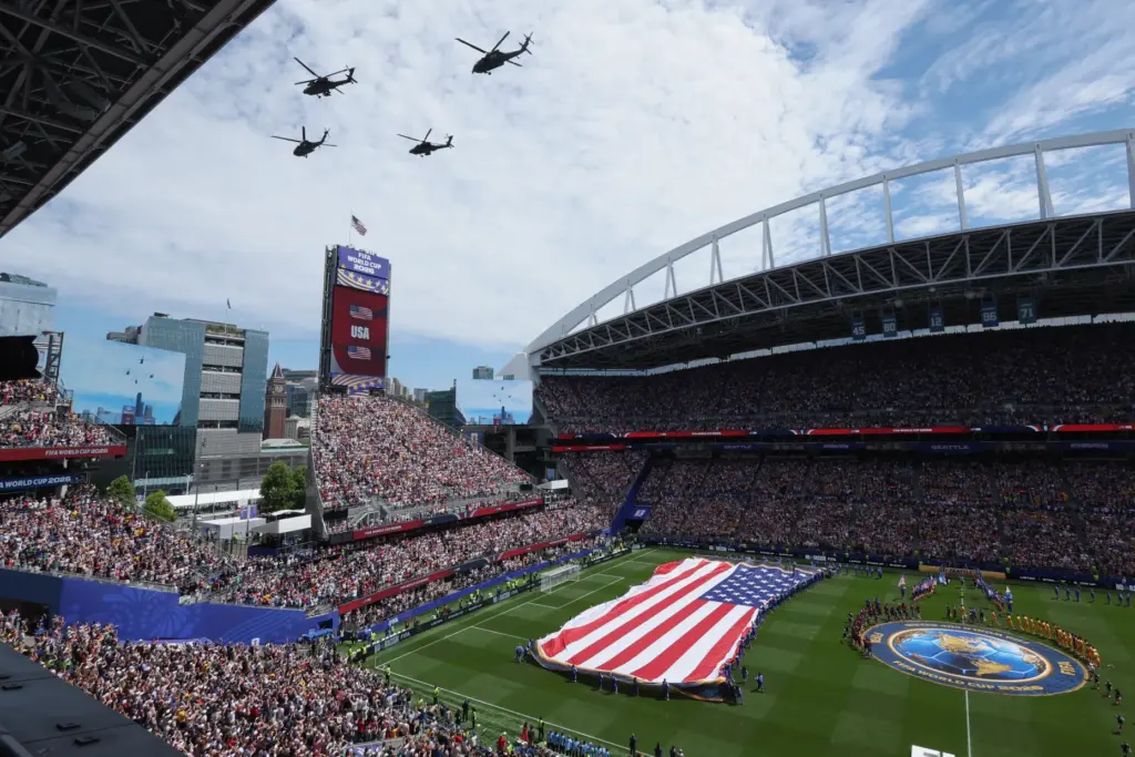 Helicopters fly over the stadium before the World Cup Group...