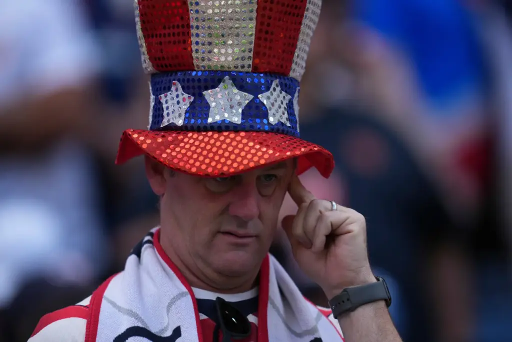 A spectator waits for the start of the World Cup...