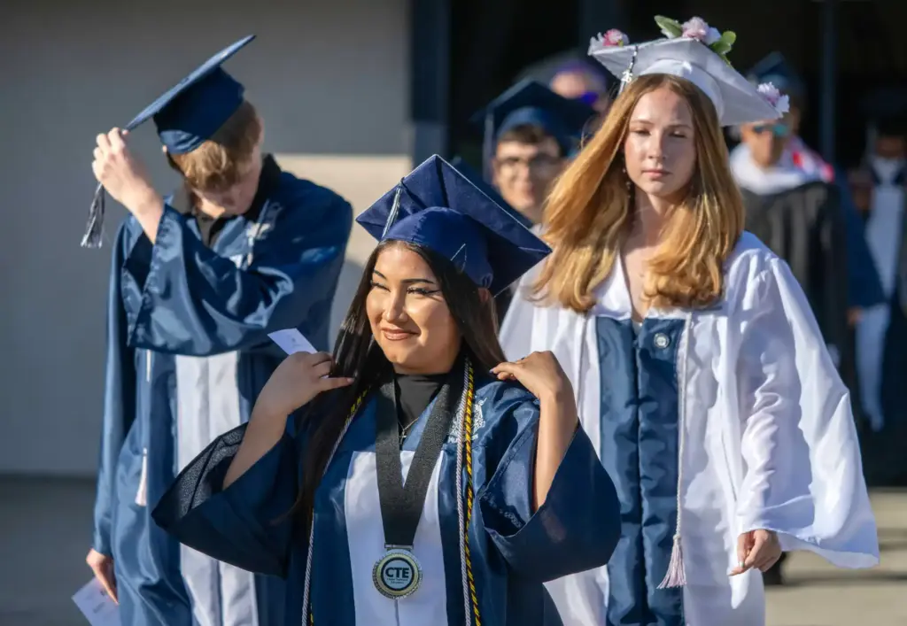 Members of Trabuco Hills High Schoolâs class of 2026 file...