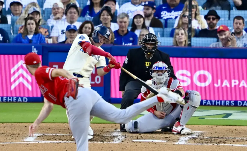 Ryan Ward #67 of the Dodgers doubles in two runs...