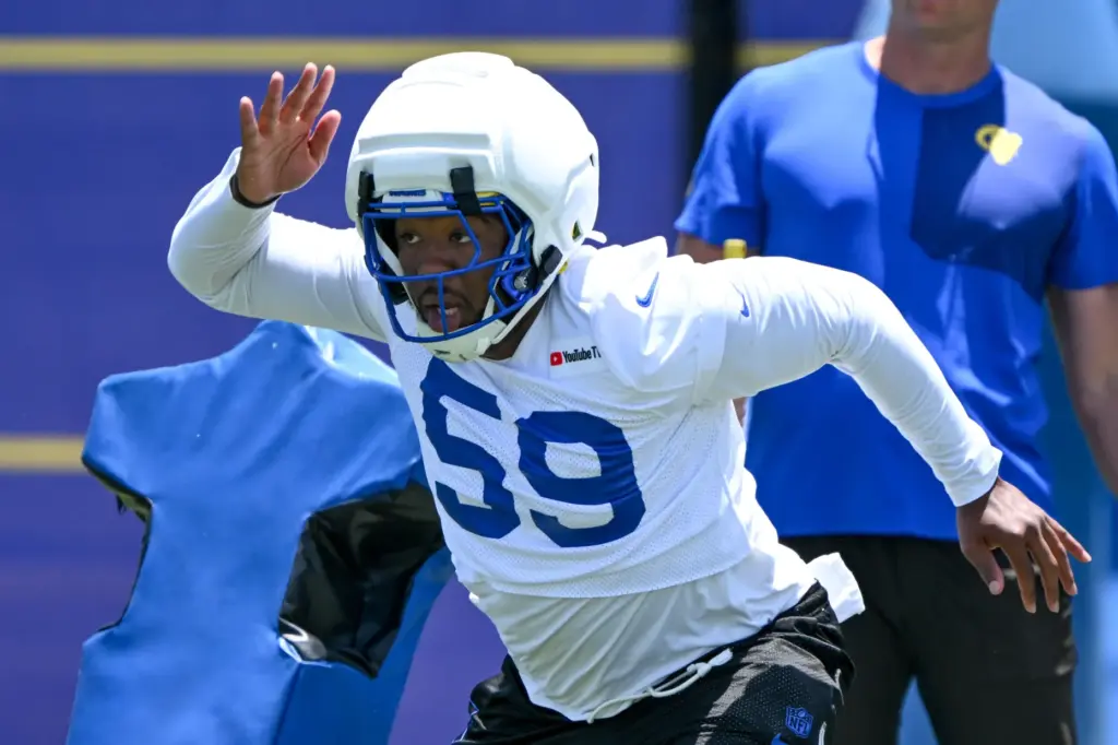 Rams linebacker Darryl Peterson III goes through drills during an...