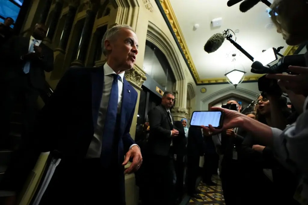 Prime Minister Mark Carney arrives to a caucus meeting in Ottawa.